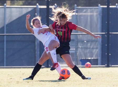 Alexa Benitez battles Fresno's Taylor Alkire for the ball during the CCCAA State final in Sacramento. (Photo by David Sanborn)